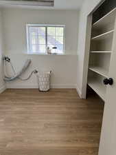 Interior space featuring wood finished floors and baseboards