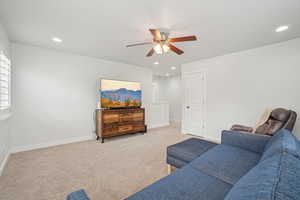 Upstairs Living area featuring a ceiling fan, recessed lighting, baseboards, and light colored carpet