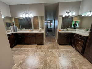 Ensuite bathroom featuring two vanities