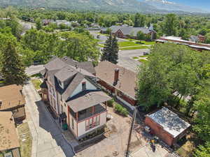 Aerial view of residential area featuring a mountainous background