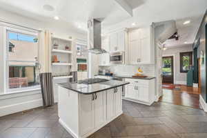 Kitchen with view to the grand foyer