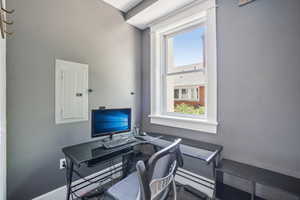 Office area with electric panel and baseboard heating - Can also be bike and equipment room!