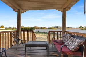 Wooden terrace featuring a fenced backyard