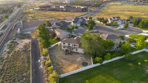 Aerial overview of property's location with nearby suburban area