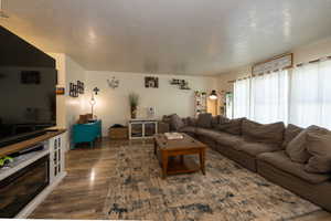 Living area featuring wood finished floors