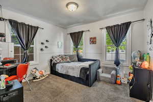 Bedroom featuring carpet flooring