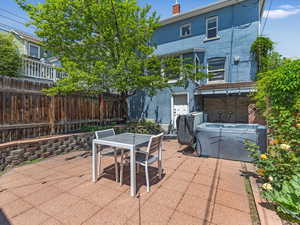 View of patio / terrace featuring outdoor dining space and grilling area