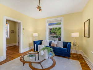 Living area featuring wood finished floors and baseboards