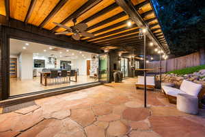 View of patio / terrace with a ceiling fan and outdoor dining space