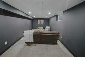 Home theater room featuring carpet flooring, baseboards, plenty of natural light, and recessed lighting