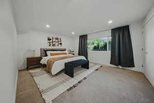 Bedroom featuring recessed lighting, light colored carpet, and baseboards