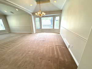 Formal dining area with bay window.