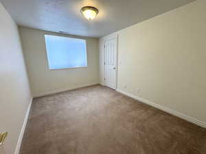 Bedroom with walk-in closet.