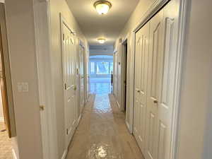 Hall with storage closets.