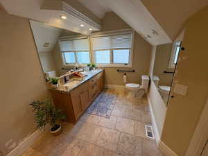 Primary bath up with shades and lots of natural light