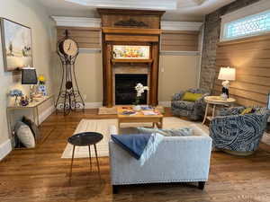 Living area with rock accents and a cozy fireplace