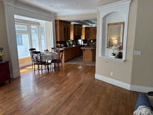 Great room to semiformal dining area and a bay window to kitchen and a alcove/nook for displaying treasures and decorative pieces