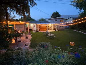 Backyard with lights in the evening