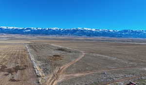 View of mountain background to the East featuring rural landscape.