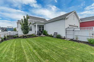 Large Fenced backyard with a privacy fence