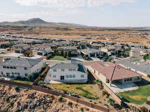 Aerial view of residential area with a mountainous background