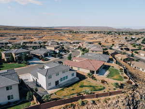 Aerial view of residential area featuring mountains