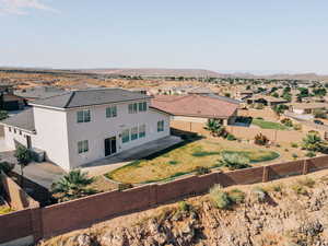 Aerial view of residential area featuring mountains