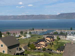 Aerial view of a water and mountain view and a marina