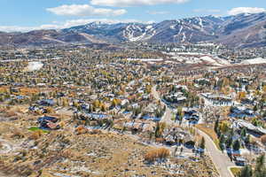 View of mountain background featuring nearby suburban area