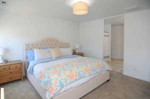 Bedroom featuring carpet