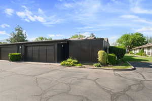 View of front of home featuring community garages