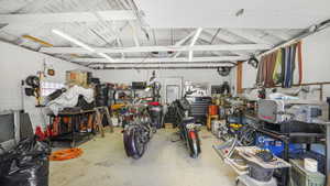 Garage featuring a workshop area