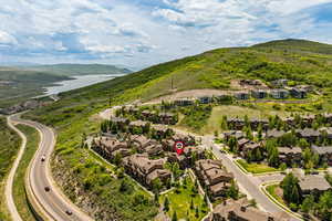 Aerial view of residential area featuring a water and mountain view