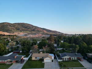 View of mountain backdrop with nearby suburban area