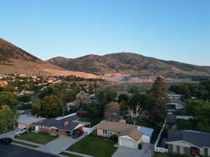 View of mountain backdrop with nearby suburban area