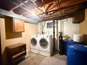 Washroom with washing machine and dryer