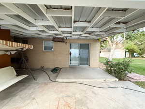 View of patio / terrace featuring an outbuilding
