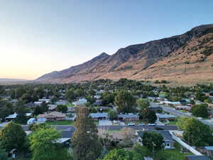 Aerial view at dusk of a mountain view and a residential view