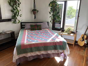 Bedroom featuring hardwood / wood-style floors