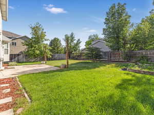 View of yard with a patio area