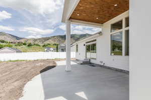 View of patio / terrace with a mountain view
