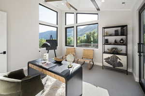 Office space featuring baseboards, a ceiling fan, carpet floors, a mountain view, and recessed lighting