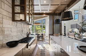 Kitchen featuring gas stovetop, modern cabinets, wooden ceiling with exposed beams, recessed lighting, and healthy amount of natural light