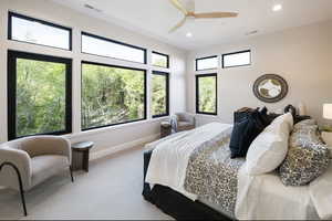 Carpeted bedroom with recessed lighting, baseboards, and ceiling fan