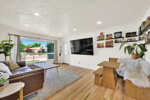 Large front living room with hardwood floors