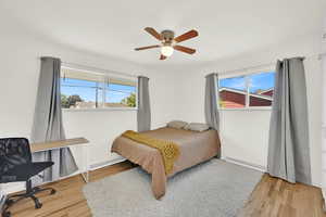 Bedroom 1 upstairs with hardwood floors