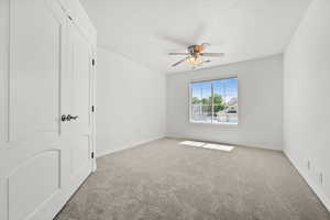 Carpeted bedroom.