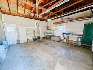 Garage featuring a garage door opener