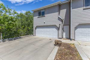 View of front of home featuring a garage and driveway