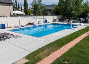 View of pool featuring a patio area